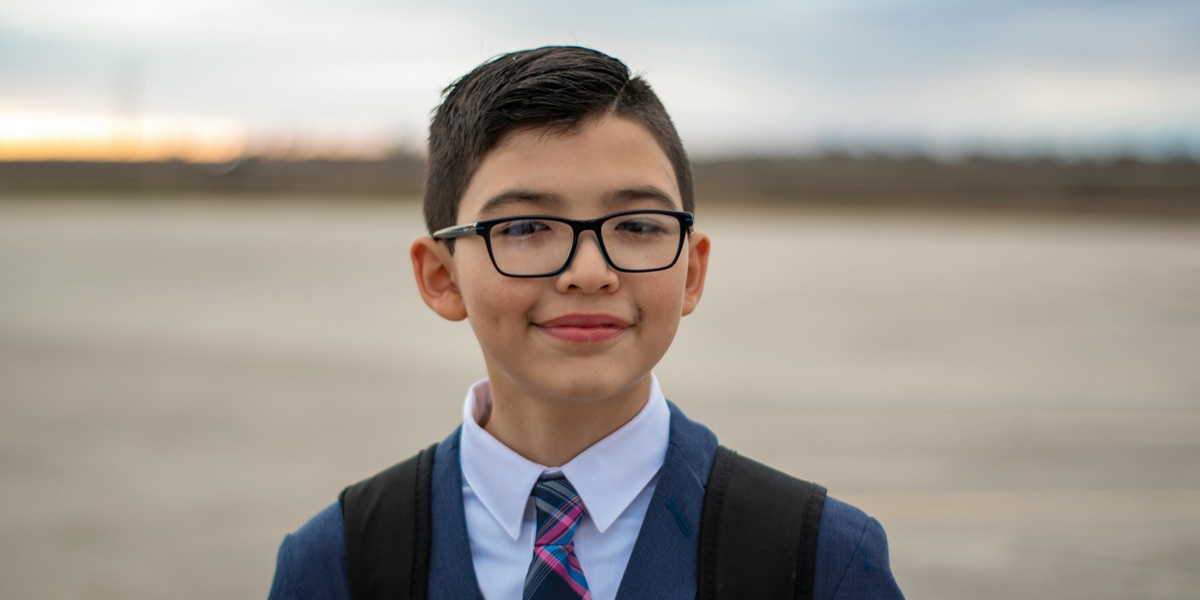 Children smiling with glasses